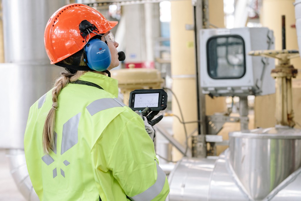 Female operator at facility